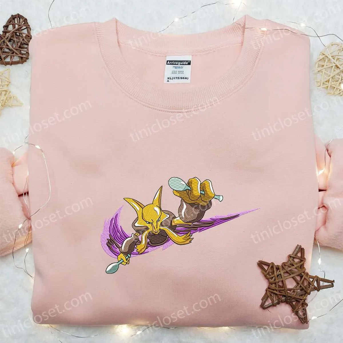 alakazam-x-nike-swoosh-anime-embroidered-shirt-pokemon-embroidered-shirt-nike-inspired-embroidered-shirt-stcbq.webp