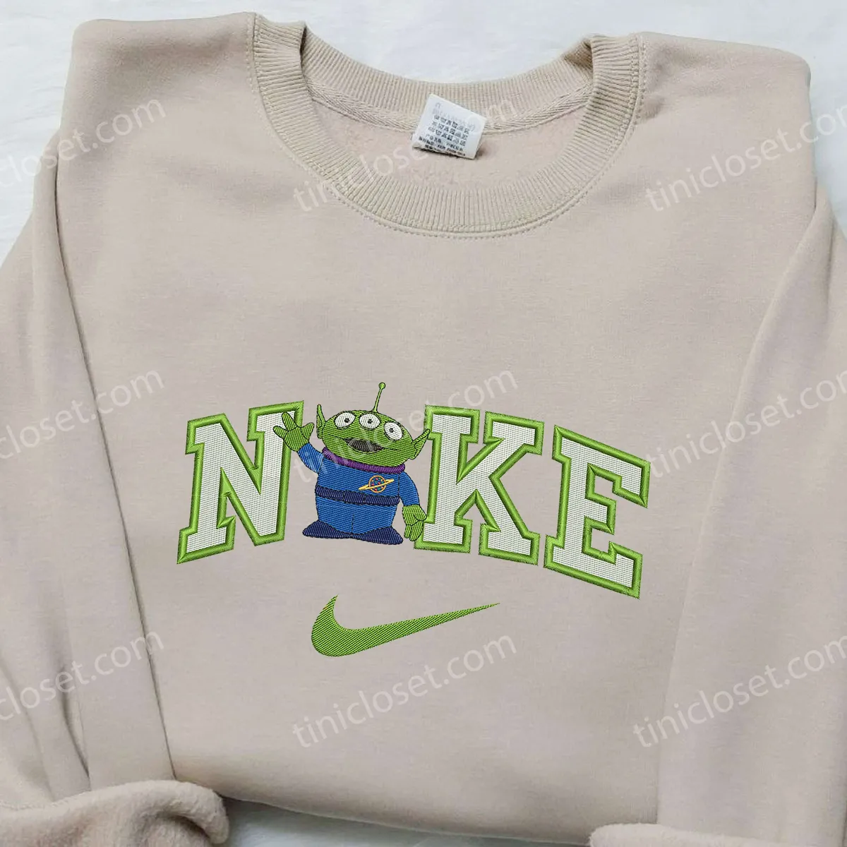 alien-toy-story-x-nike-embroidered-shirt-disneyland-family-shirts-nike-inspired-embroidered-hoodie-qpa2r.webp