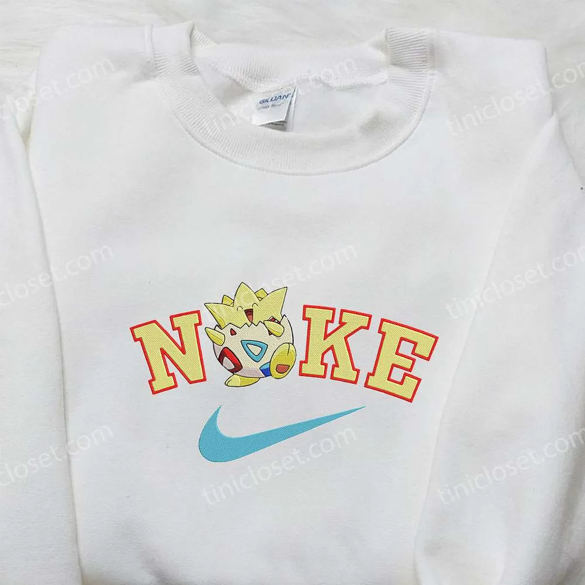 togepi-x-nike-anime-embroidered-hoodie-pokemon-embroidered-shirt-nike-inspired-embroidered-shirt-lawjc.webp