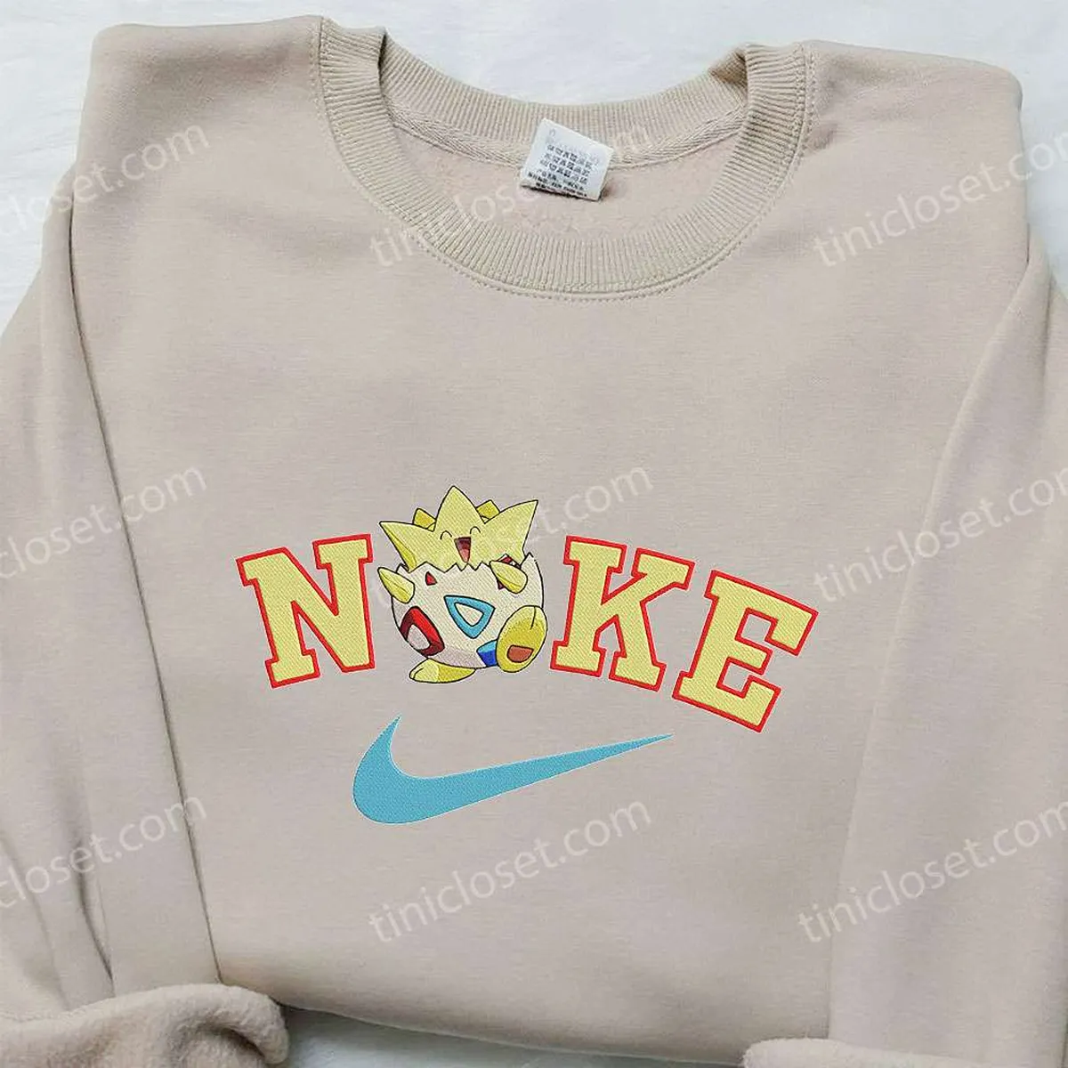togepi-x-nike-anime-embroidered-hoodie-pokemon-embroidered-shirt-nike-inspired-embroidered-shirt-zb09l.webp