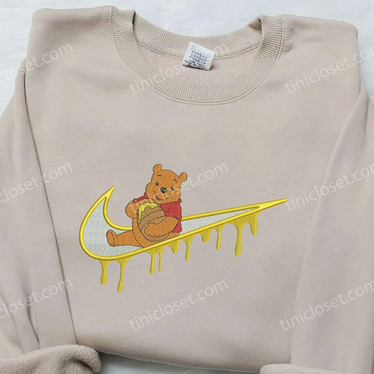 winnie-the-pooh-x-nike-swoosh-embroidered-sweatshirt-winnie-the-pooh-disney-embroidered-sweatshirt-nike-inspired-embroidered-shirt-cpuif.webp