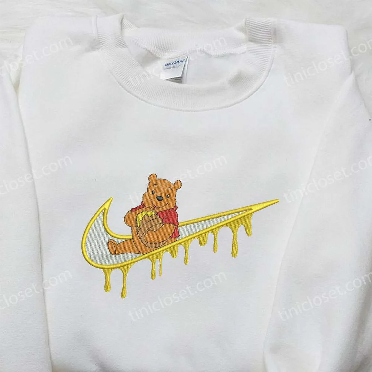 winnie-the-pooh-x-nike-swoosh-embroidered-sweatshirt-winnie-the-pooh-disney-embroidered-sweatshirt-nike-inspired-embroidered-shirt-lthrx.webp
