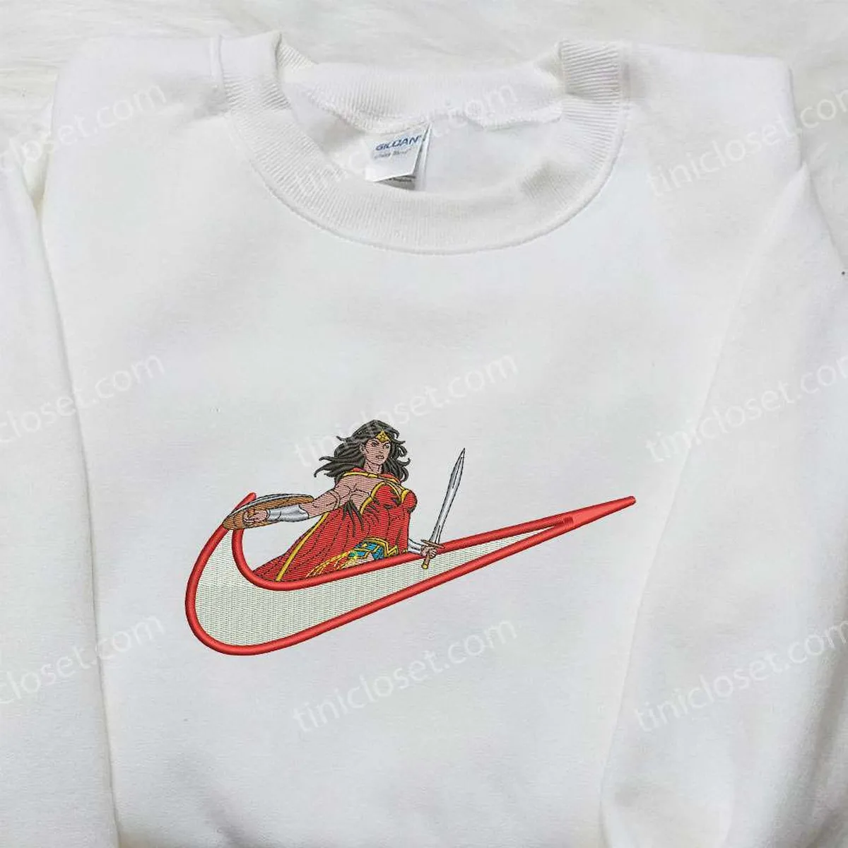 wonder-woman-x-nike-swoosh-anime-embroidered-hoodie-wonder-woman-embroidered-shirt-nike-inspired-embroidered-shirt-dzzlo.webp